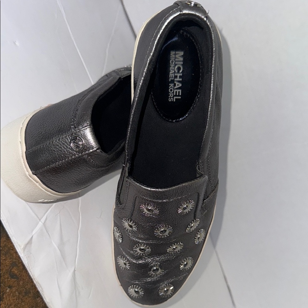 Michael Kors  Slip-On’s SZ. 7 M/37 preowned  in good condition.  price / by 40%